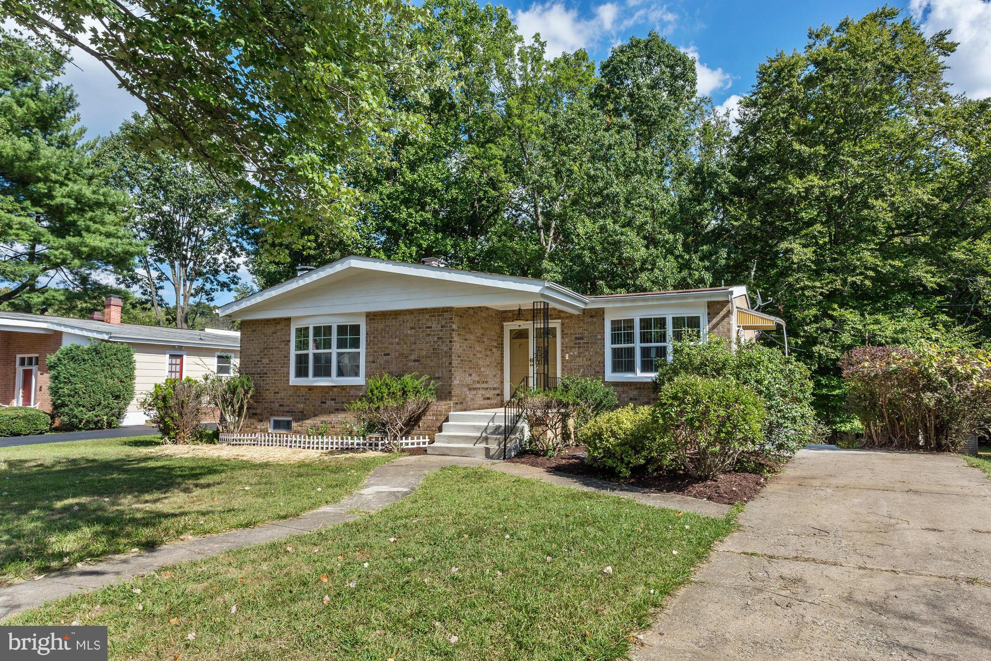 9405 Tulsemere Road Randallstown, MD 21133 - Photo 25 of 26 a front view of house with yard and green space