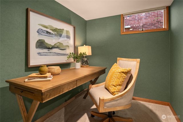 a view of a workspace with furniture