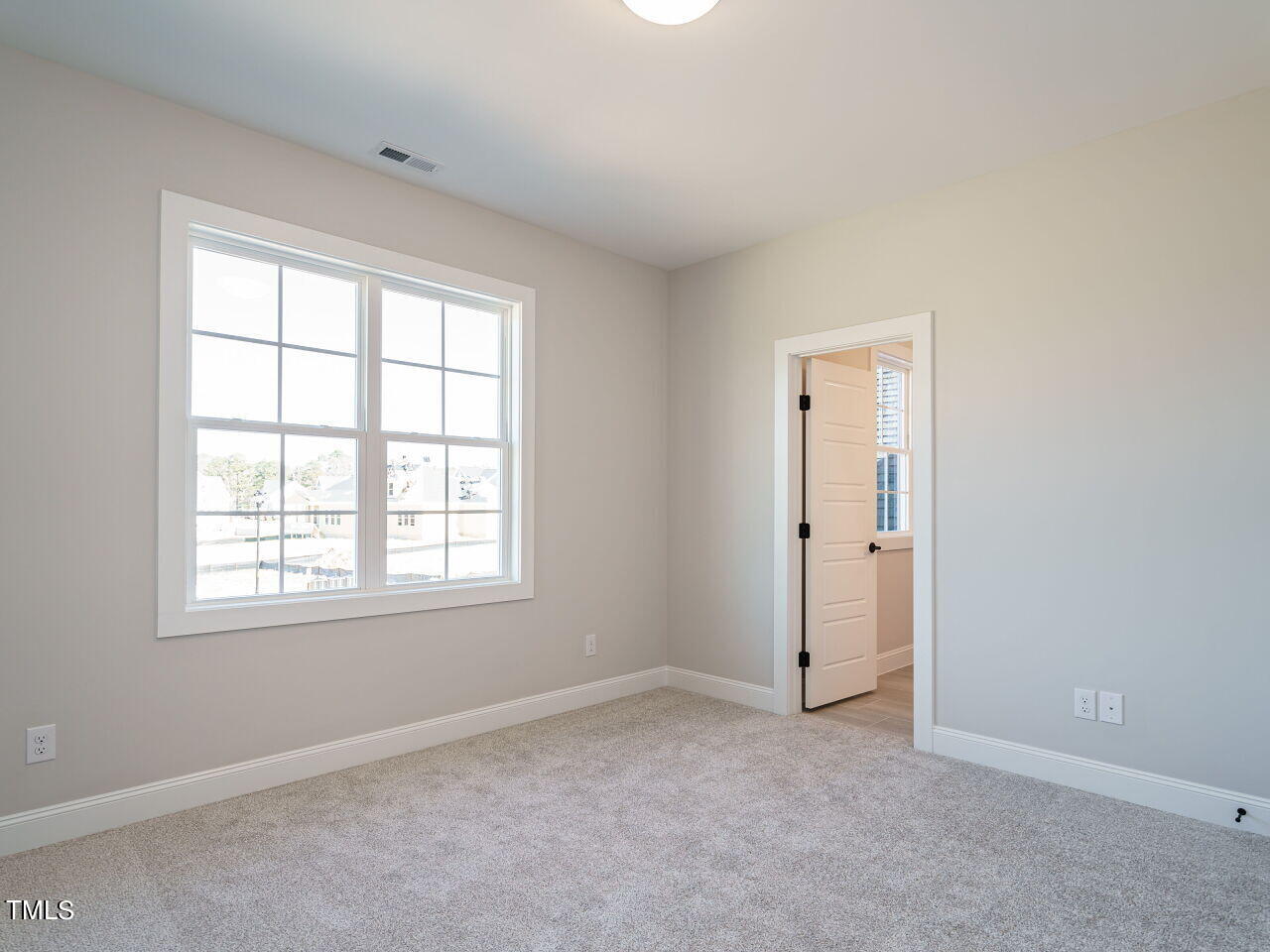924 Lily Claire Lane Fuquay-Varina, NC 27526 - Photo 17 of 32 033-1280x960-bedroom