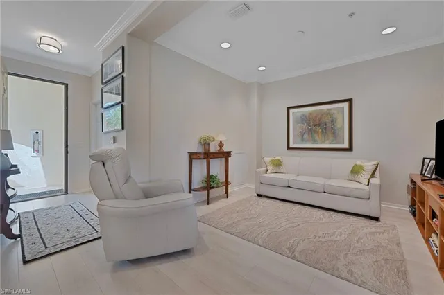 a living room with furniture and a couch