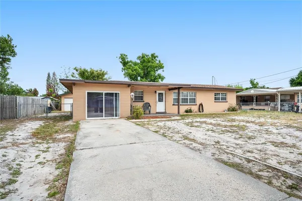 front view of a house with a big yard