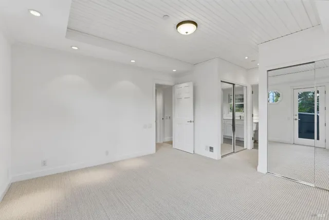 an empty room with entrance and door