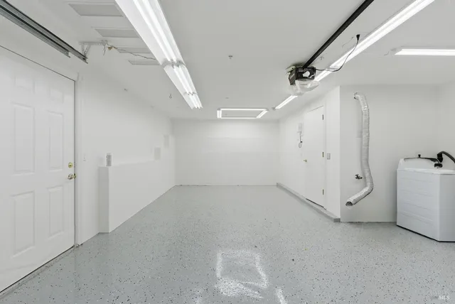 a view of a backyard of the house