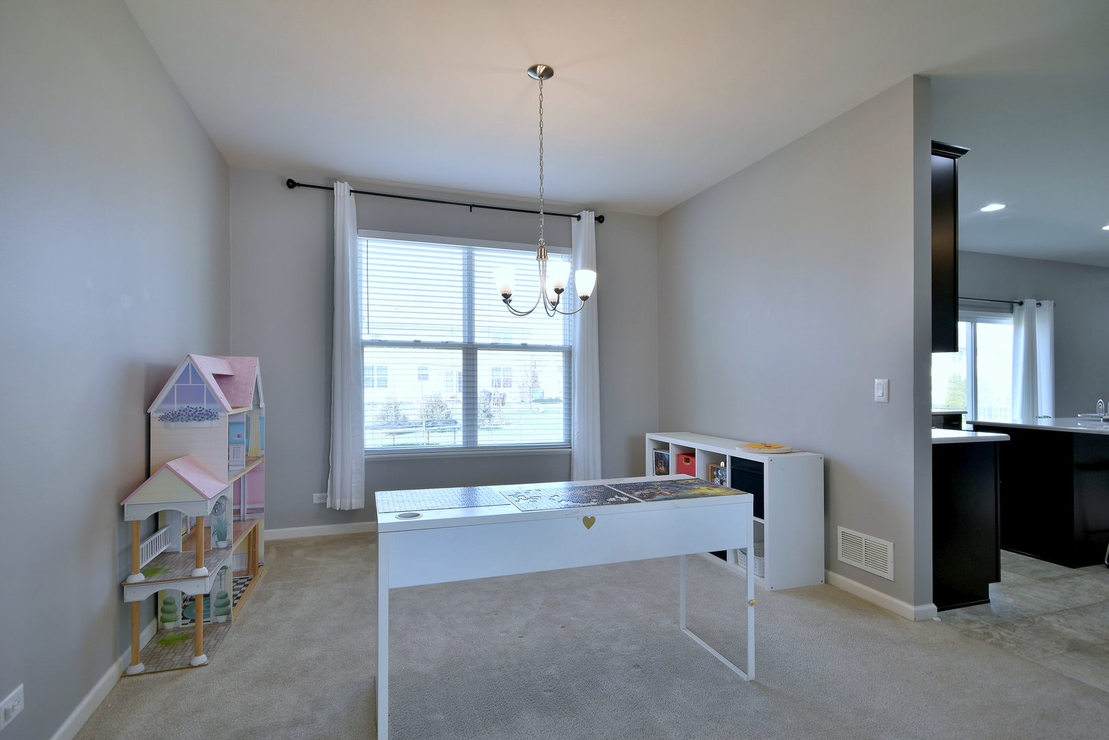 168 Reston Lane Gilberts, IL 60136 - Photo 11 of 43 a living room with furniture and a window
