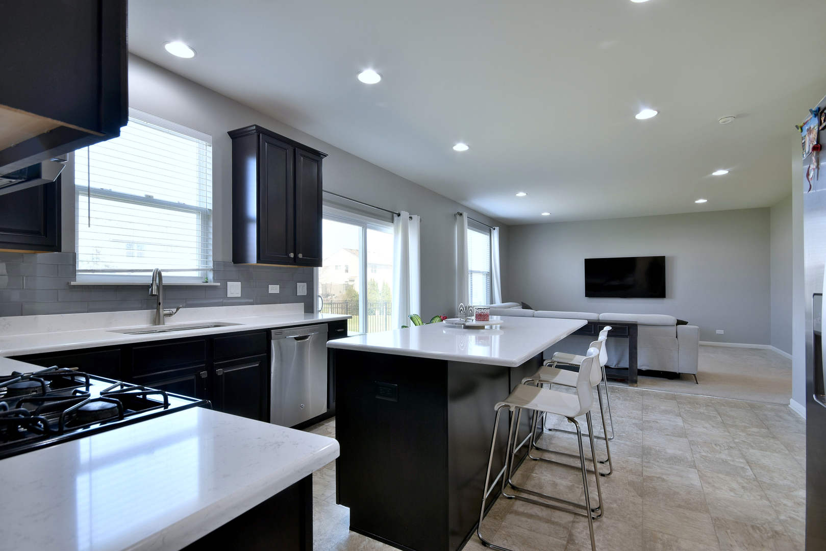 168 Reston Lane Gilberts, IL 60136 - Photo 13 of 43 a kitchen with a sink and stove
