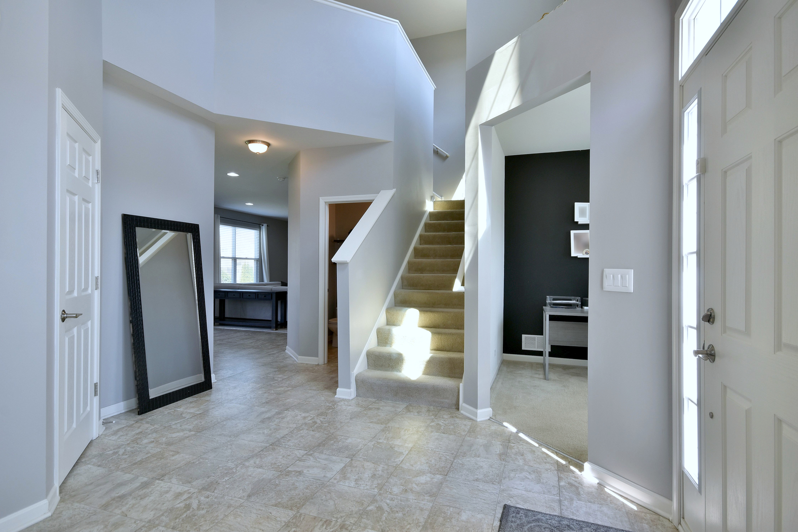 168 Reston Lane Gilberts, IL 60136 - Photo 4 of 43 wooden floor and stairs and a livingroom with furniture