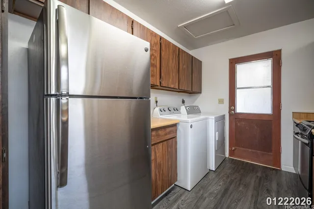 a white refrigerator freezer sitting inside of a kitchen