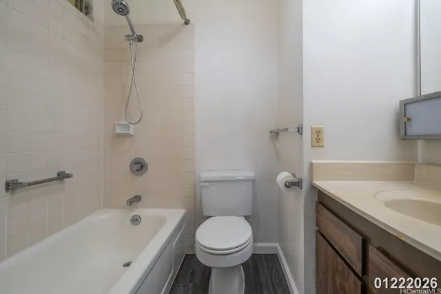 a bathroom with a sink a toilet and a bathtub