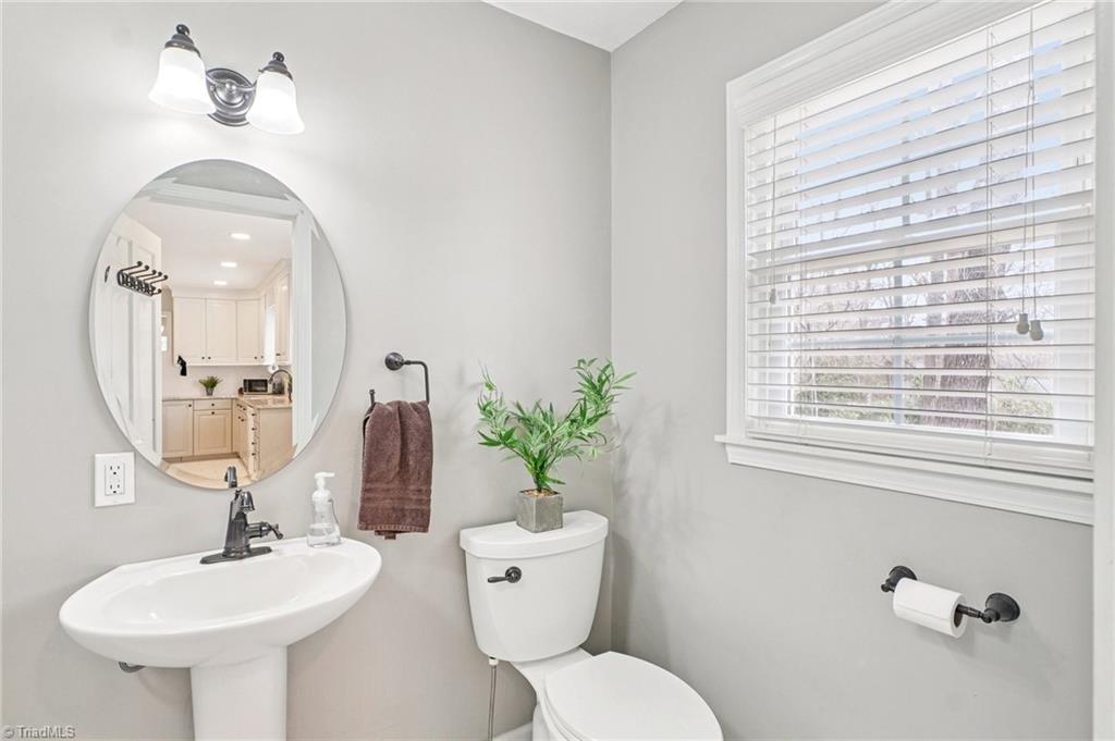 1412 Hobbs Road Greensboro, NC 27408 - Photo 15 of 47 Powder room off kitchen