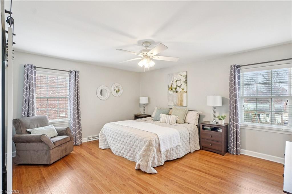 1412 Hobbs Road Greensboro, NC 27408 - Photo 27 of 47 Primary Bedroom with loads of Light!