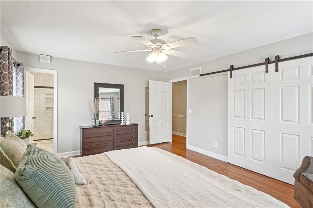 1412 Hobbs Road Greensboro, NC 27408 - Photo 28 of 47 Barn door and remodeled Bath are upgrades