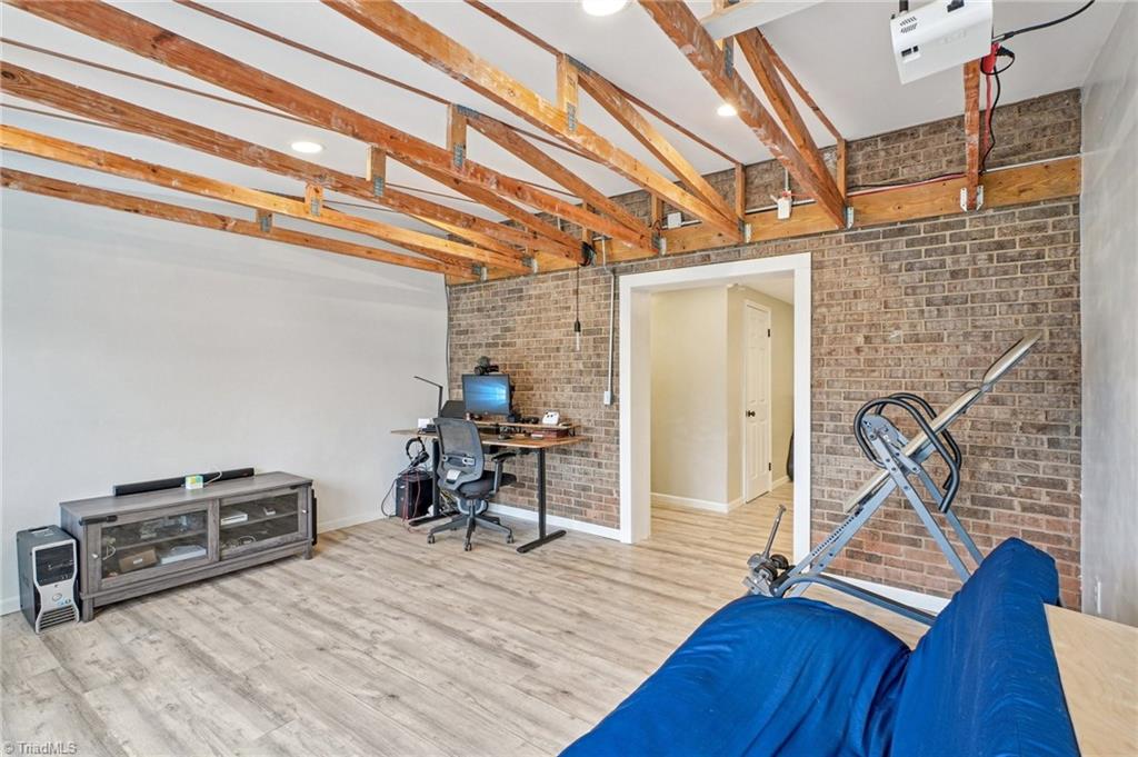 1412 Hobbs Road Greensboro, NC 27408 - Photo 36 of 47 Exposed Brick for more Charm!