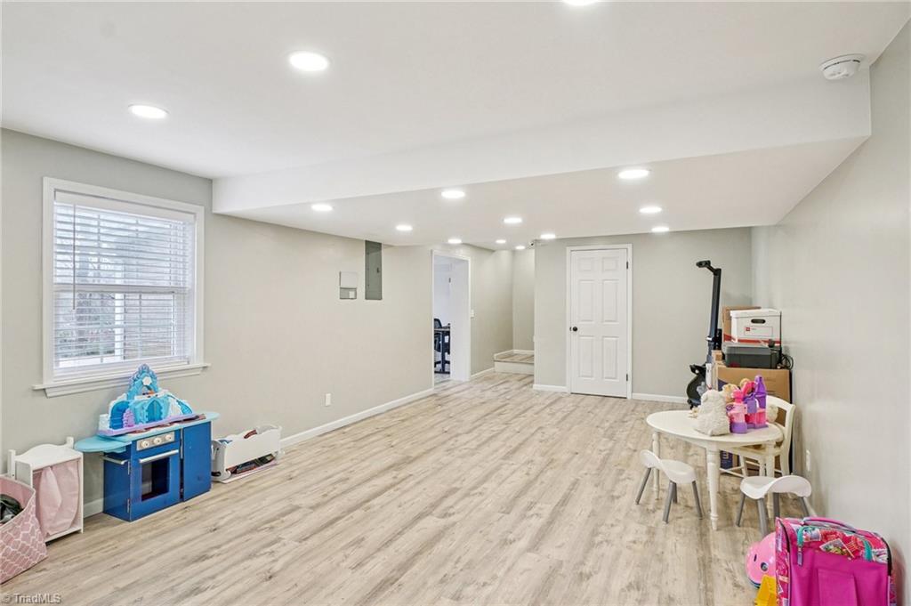 1412 Hobbs Road Greensboro, NC 27408 - Photo 38 of 47 What a great space! Game room, playroom, theatre space!