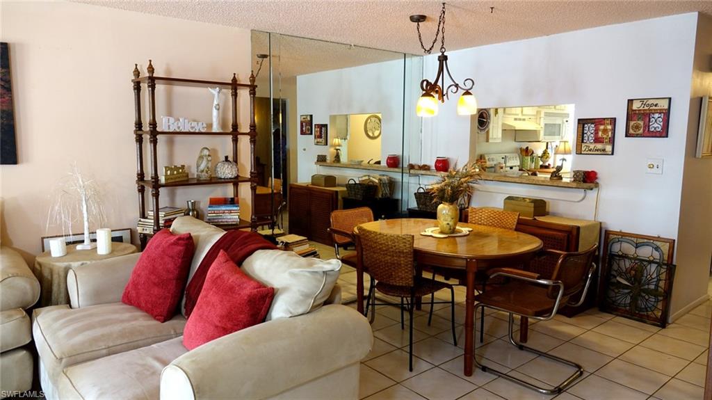 5579 Rattlesnake Hammock Road, Unit B9 Naples, FL 34113 - Photo 4 of 9 Family meals and game nights right here