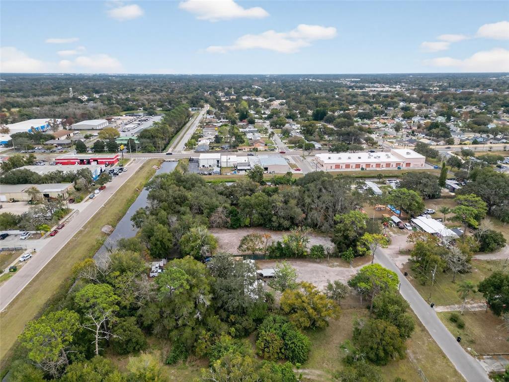 6935 Turquoise Lane Orlando, FL 32807 - Photo 11 of 27 an aerial view of residential houses with outdoor space