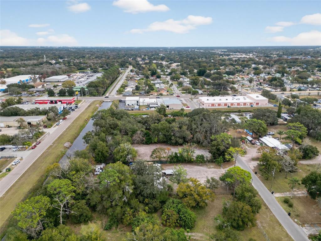 6935 Turquoise Lane Orlando, FL 32807 - Photo 19 of 27 an aerial view of residential houses with outdoor space