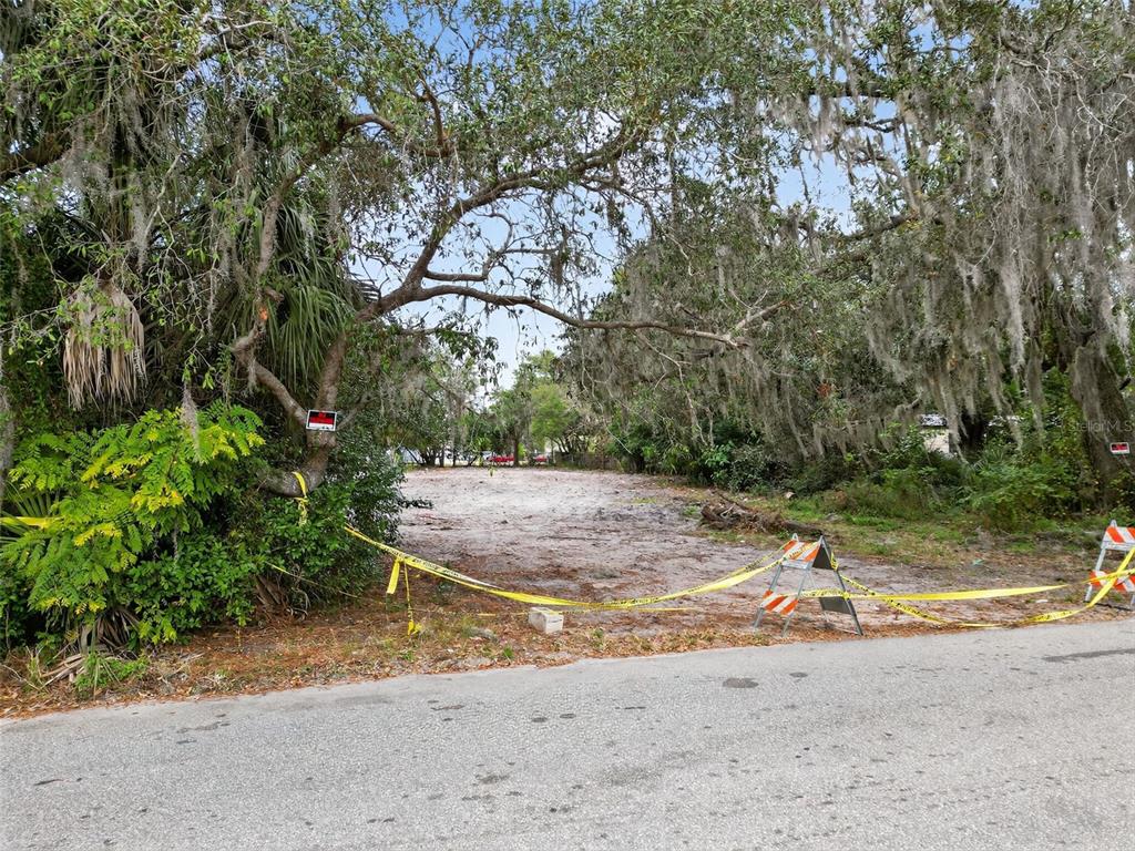 6935 Turquoise Lane Orlando, FL 32807 - Photo 23 of 27 a view of a yard with plants and trees
