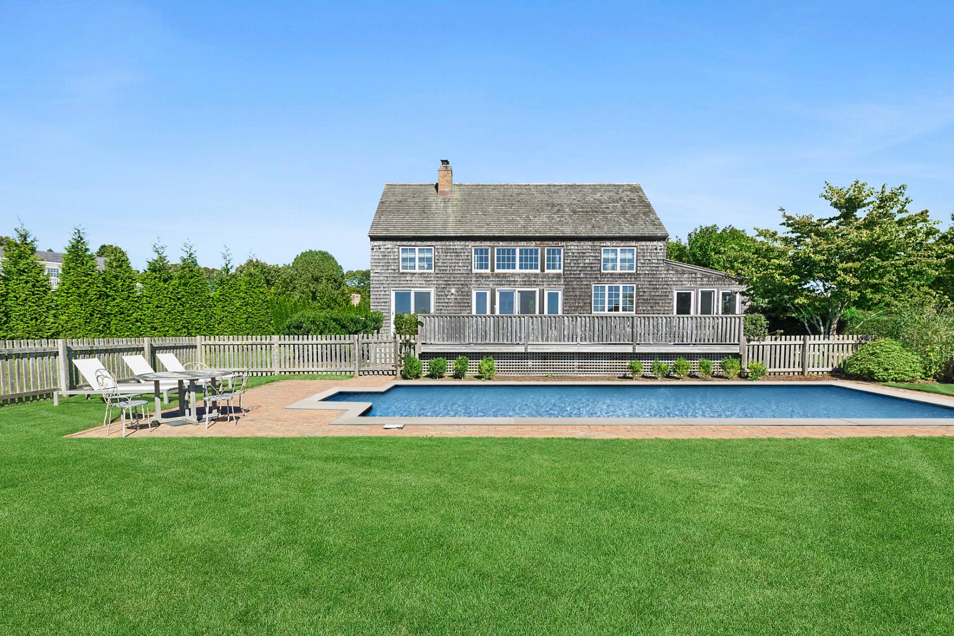 178 Sayre's Path Wainscott, NY 11975 - Photo 1 of 32 a view of a house with a yard patio and sitting area