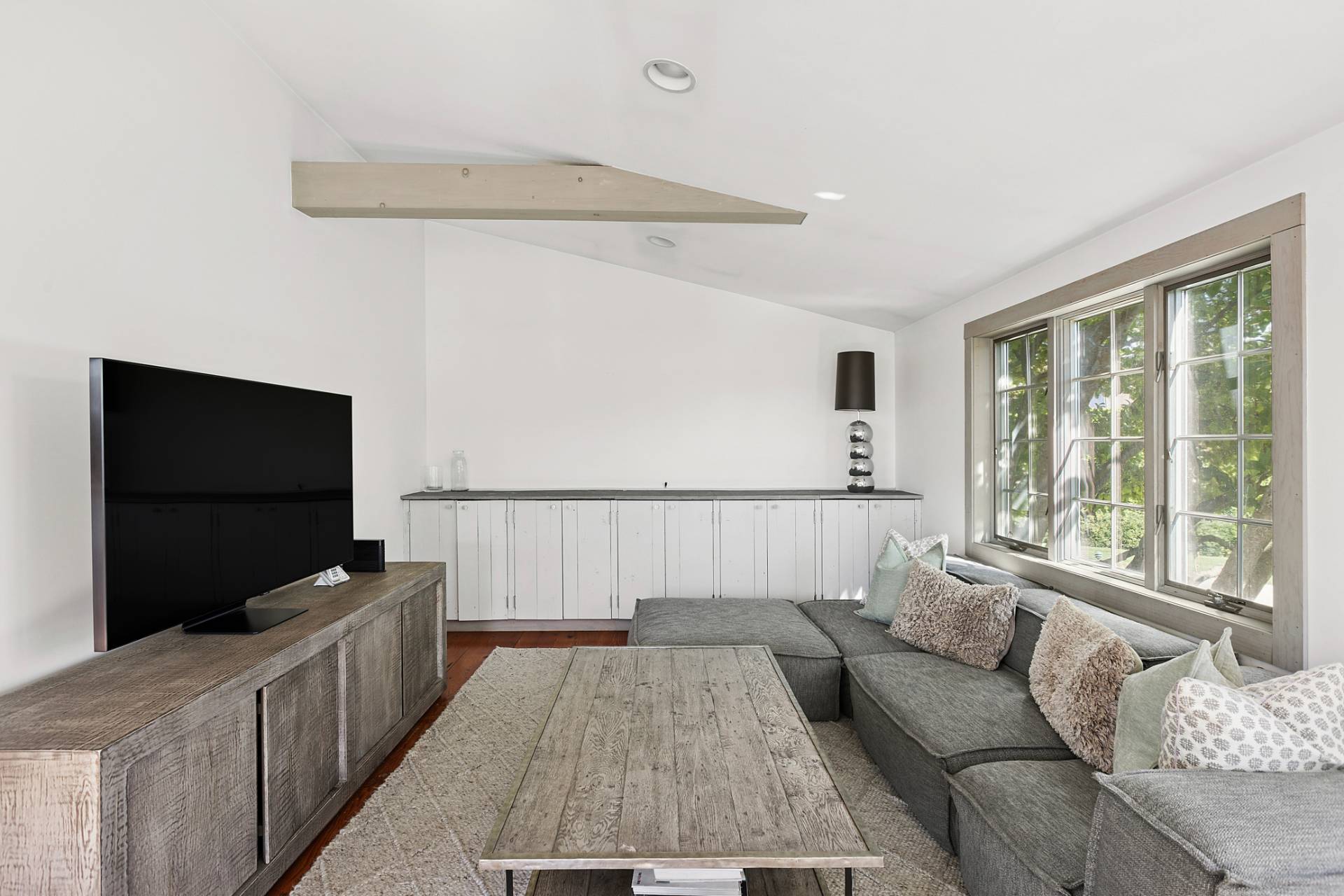 178 Sayre's Path Wainscott, NY 11975 - Photo 17 of 32 a living room with furniture and a flat screen tv