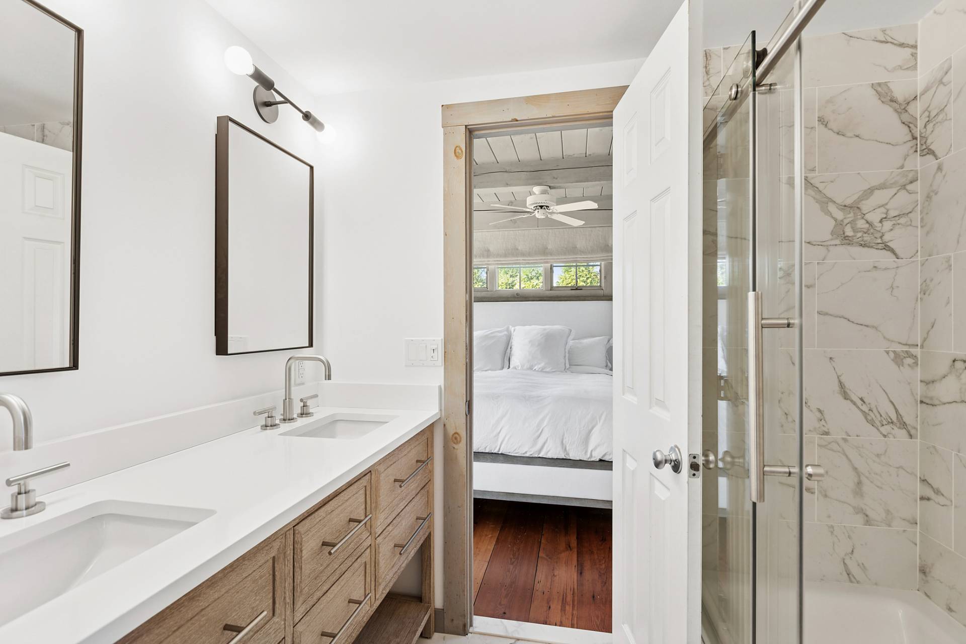 178 Sayre's Path Wainscott, NY 11975 - Photo 22 of 32 a en suite bathroom with a sink a mirror and a shower