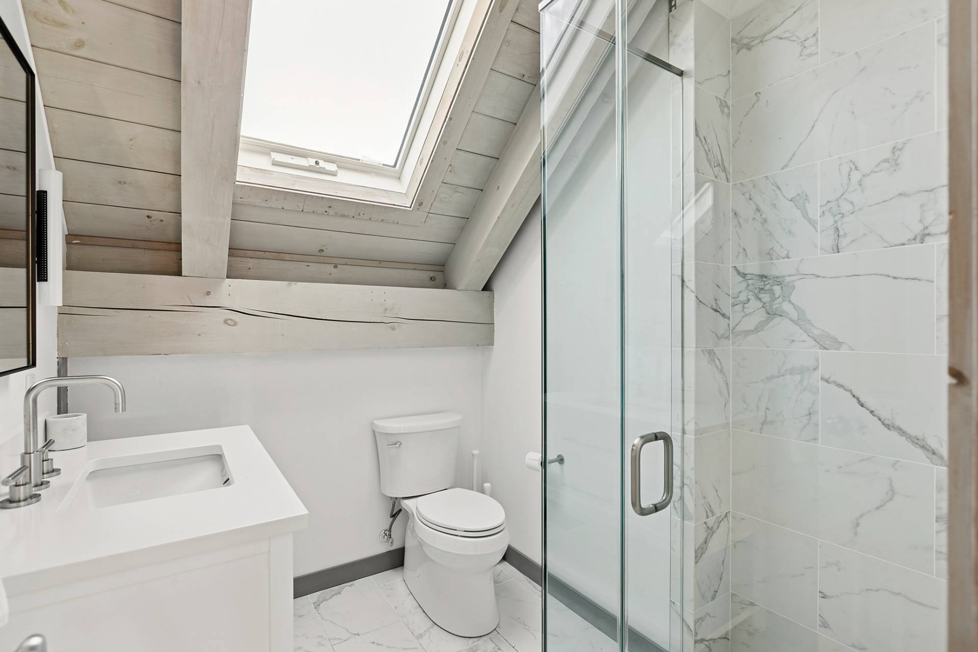 178 Sayre's Path Wainscott, NY 11975 - Photo 28 of 32 a bathroom with a toilet sink and shower