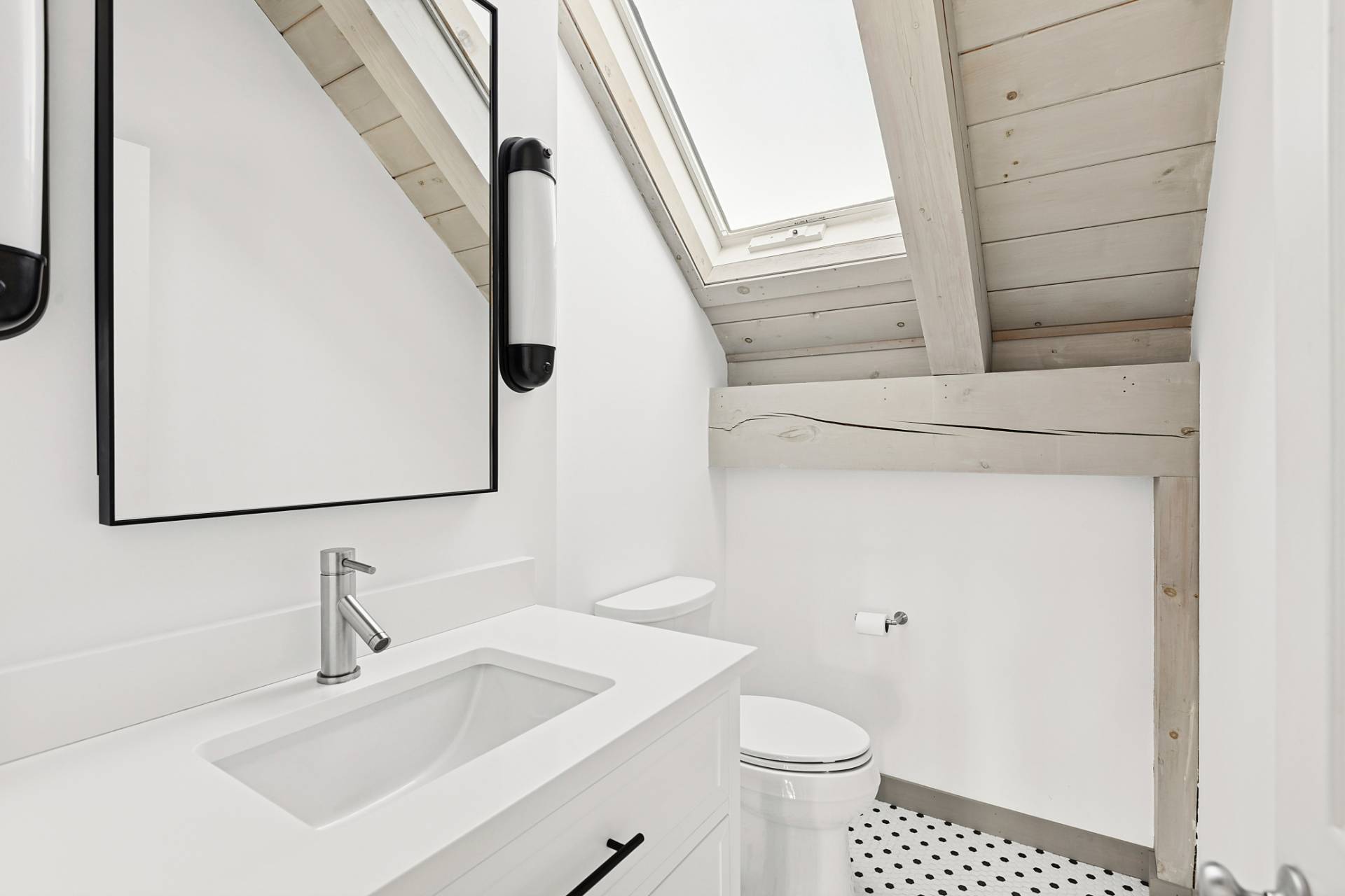 178 Sayre's Path Wainscott, NY 11975 - Photo 30 of 32 a bathroom with a sink toilet and vanity