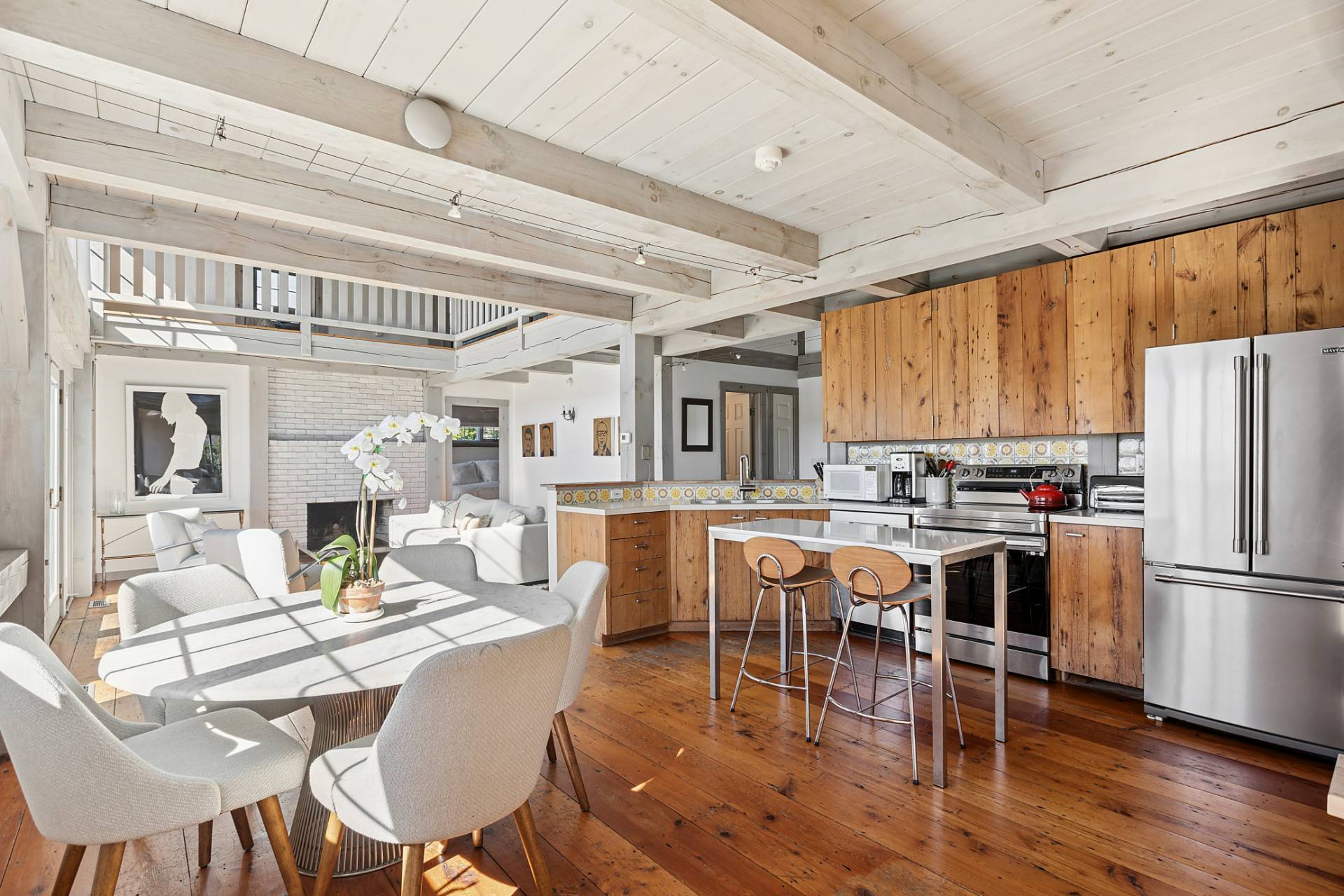 178 Sayre's Path Wainscott, NY 11975 - Photo 10 of 32 a view of a dining room with furniture window and wooden floor