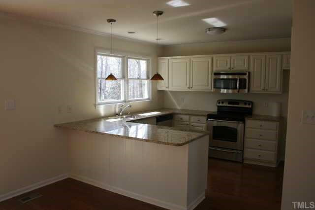 4204 Frost Court Raleigh, NC 27609 - Photo 3 of 6 View of new kitchen with stainless appliances and granite countertops. Other