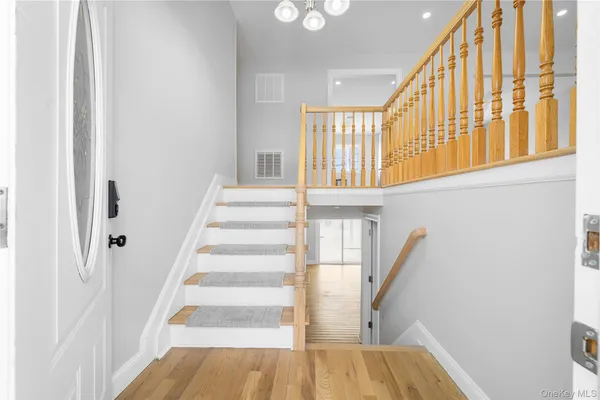 a view of staircase with large window