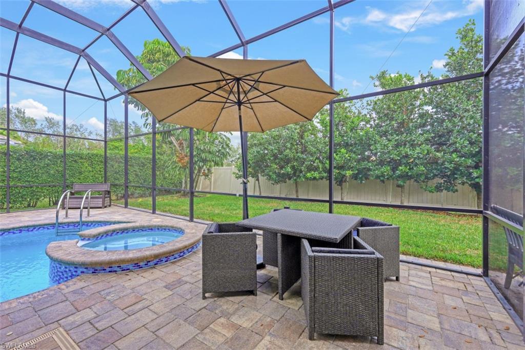 7235 Mill Run Road Naples, FL 34109 - Photo 29 of 31 a outdoor view with a sitting space