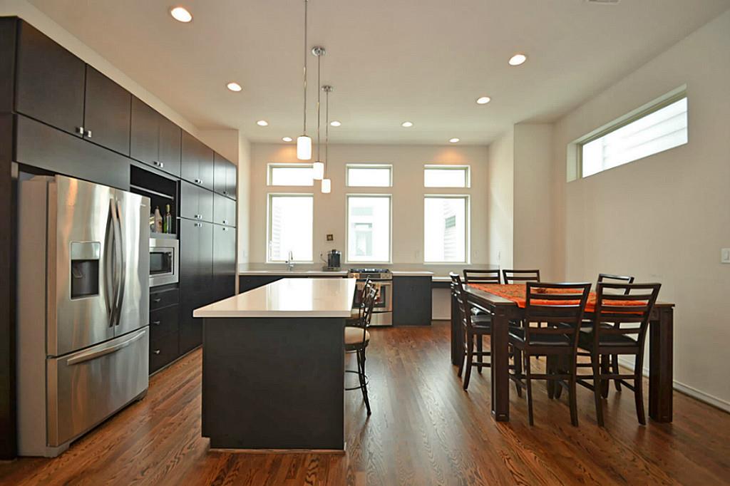 2713 Clay Street Houston, TX 77003 - Photo 7 of 24 Very open kitchen/dining room with large windows which fill the room with plenty of sunlight.