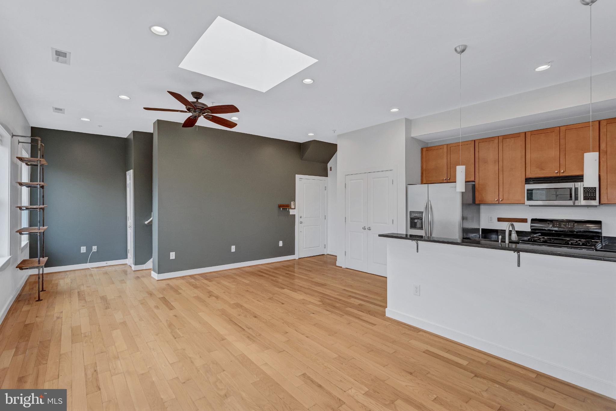 1240 4th Street Northwest, Unit 300 Washington, DC 20001 - Photo 11 of 31 Spacious modern living area with natural light.