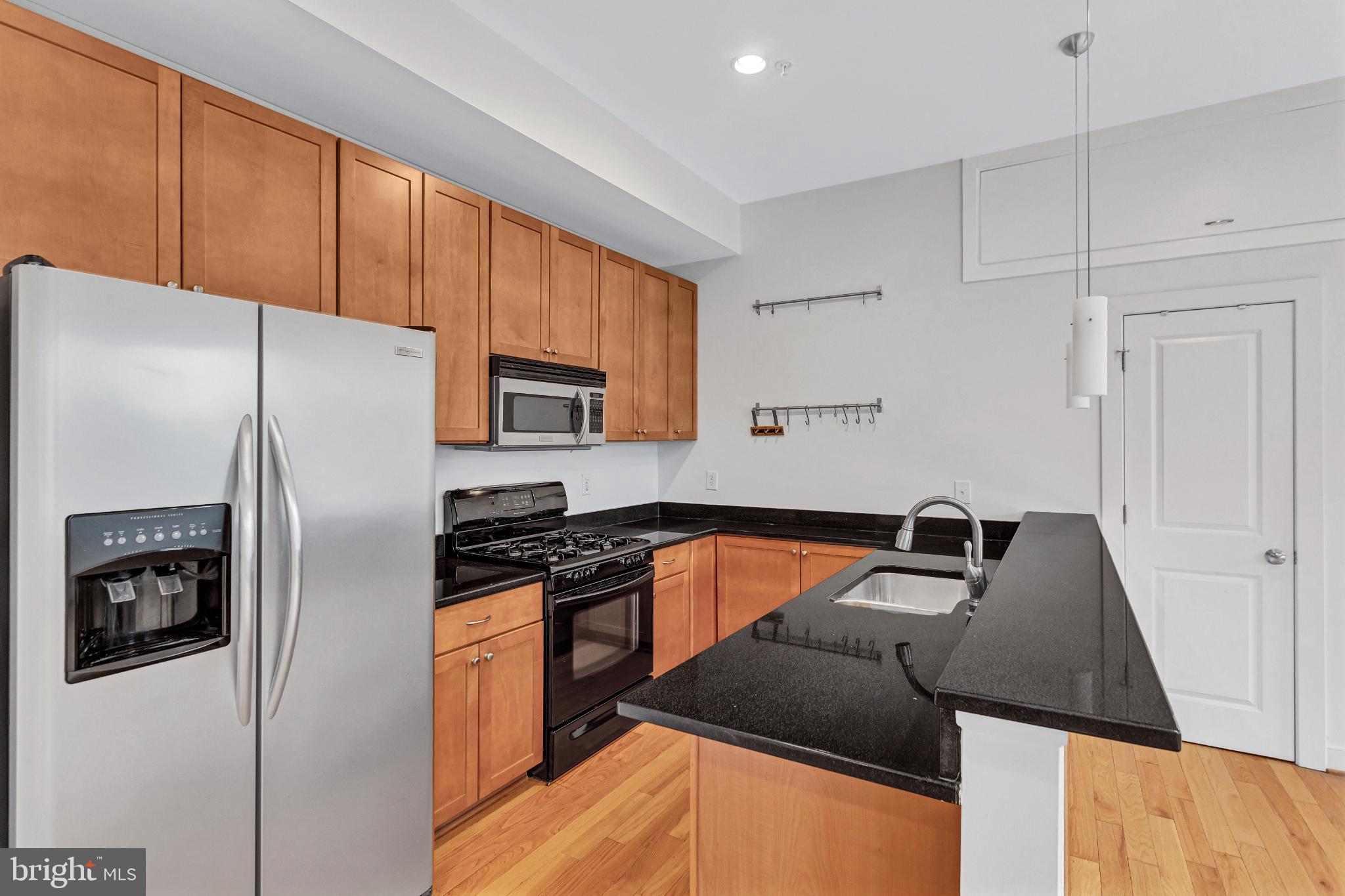 1240 4th Street Northwest, Unit 300 Washington, DC 20001 - Photo 18 of 31 Sleek kitchen with modern finishes.