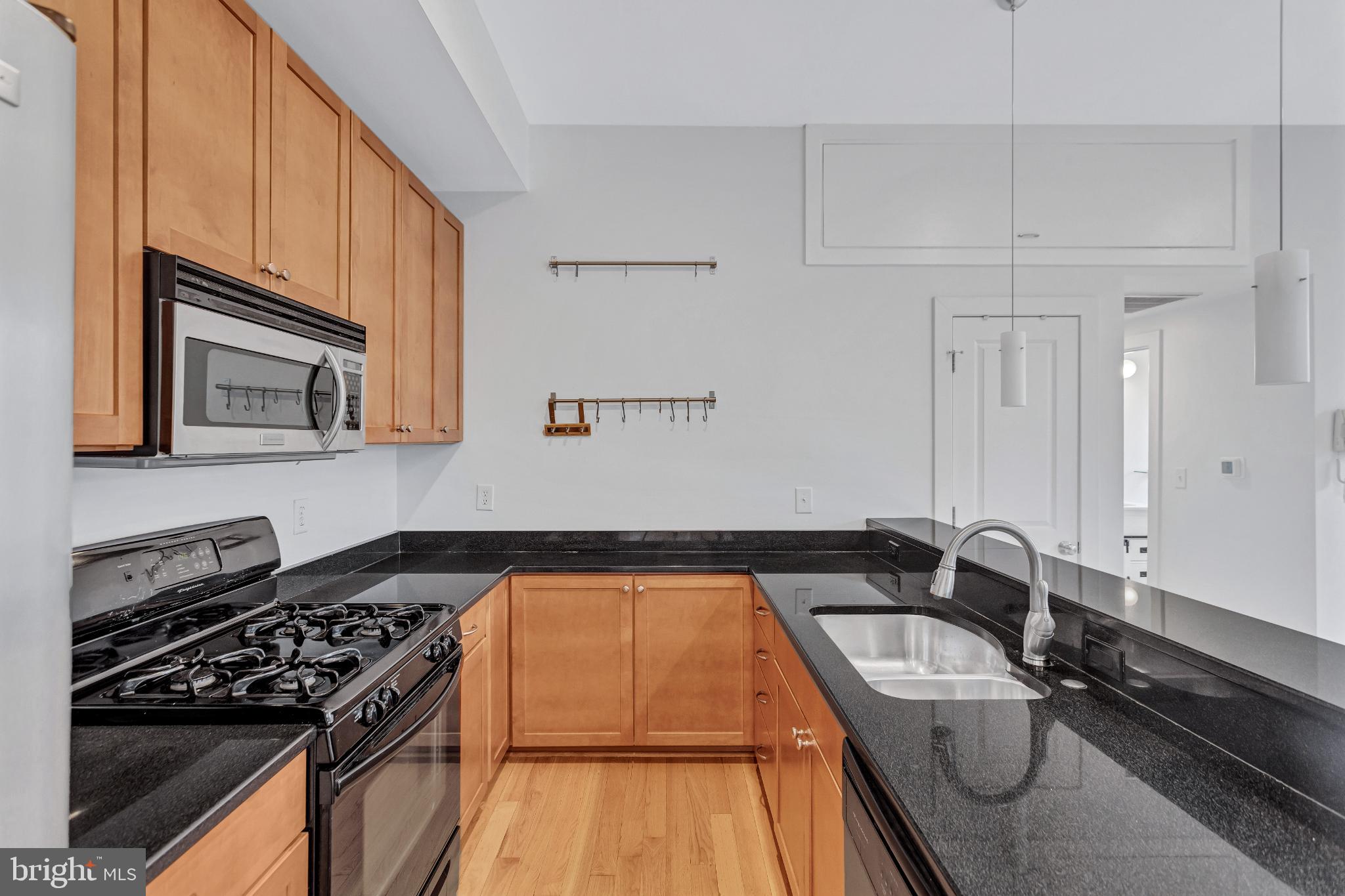 1240 4th Street Northwest, Unit 300 Washington, DC 20001 - Photo 19 of 31 Sleek kitchen with modern finishes.