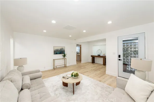 a living room with furniture and a couch