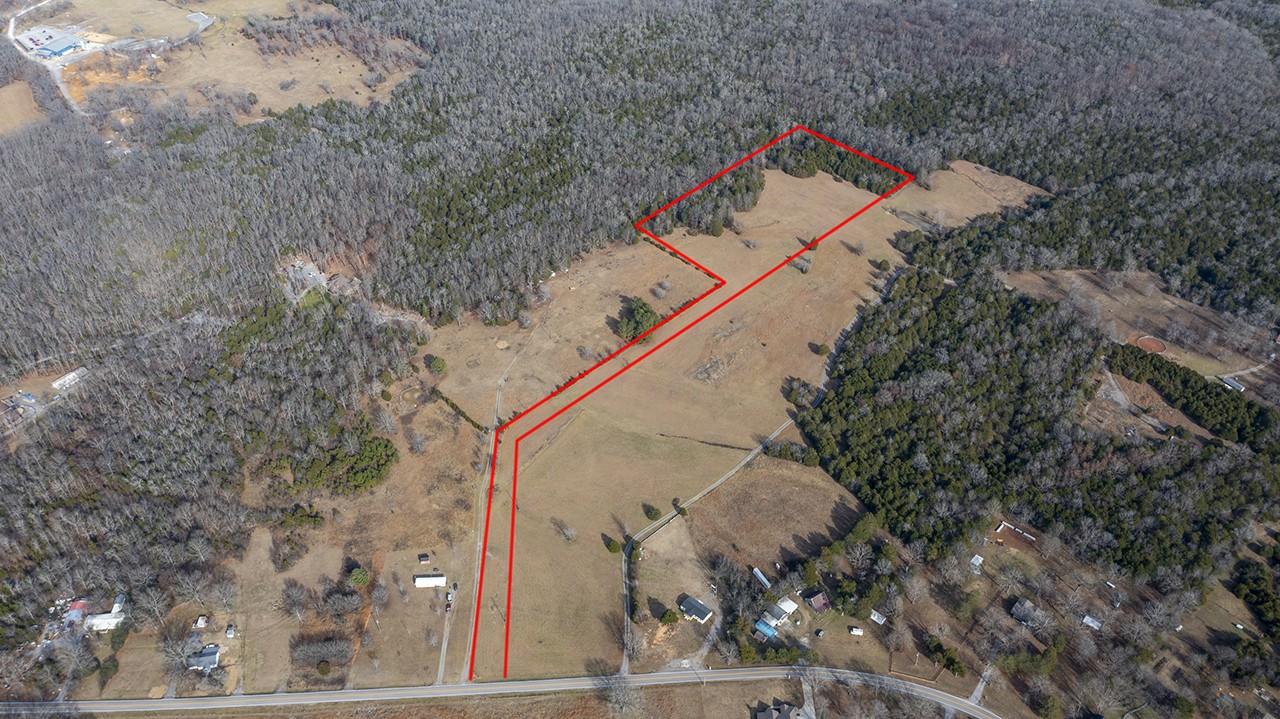 0 Floraton Road Readyville, TN 37149 - Photo 3 of 16 a view of a dry yard with large trees