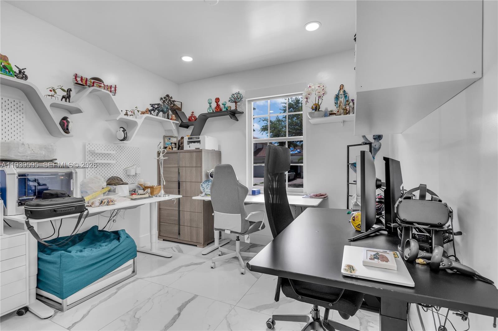 18801 Southwest 25th Court Miramar, FL 33029 - Photo 18 of 28 a view of a workspace with kitchen