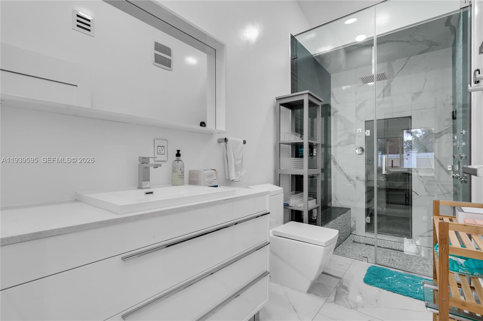 18801 Southwest 25th Court Miramar, FL 33029 - Photo 24 of 28 a bathroom with a sink toilet tub and shower