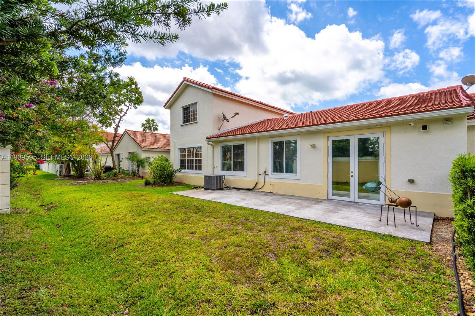 18801 Southwest 25th Court Miramar, FL 33029 - Photo 27 of 28 a front view of house with yard and porch