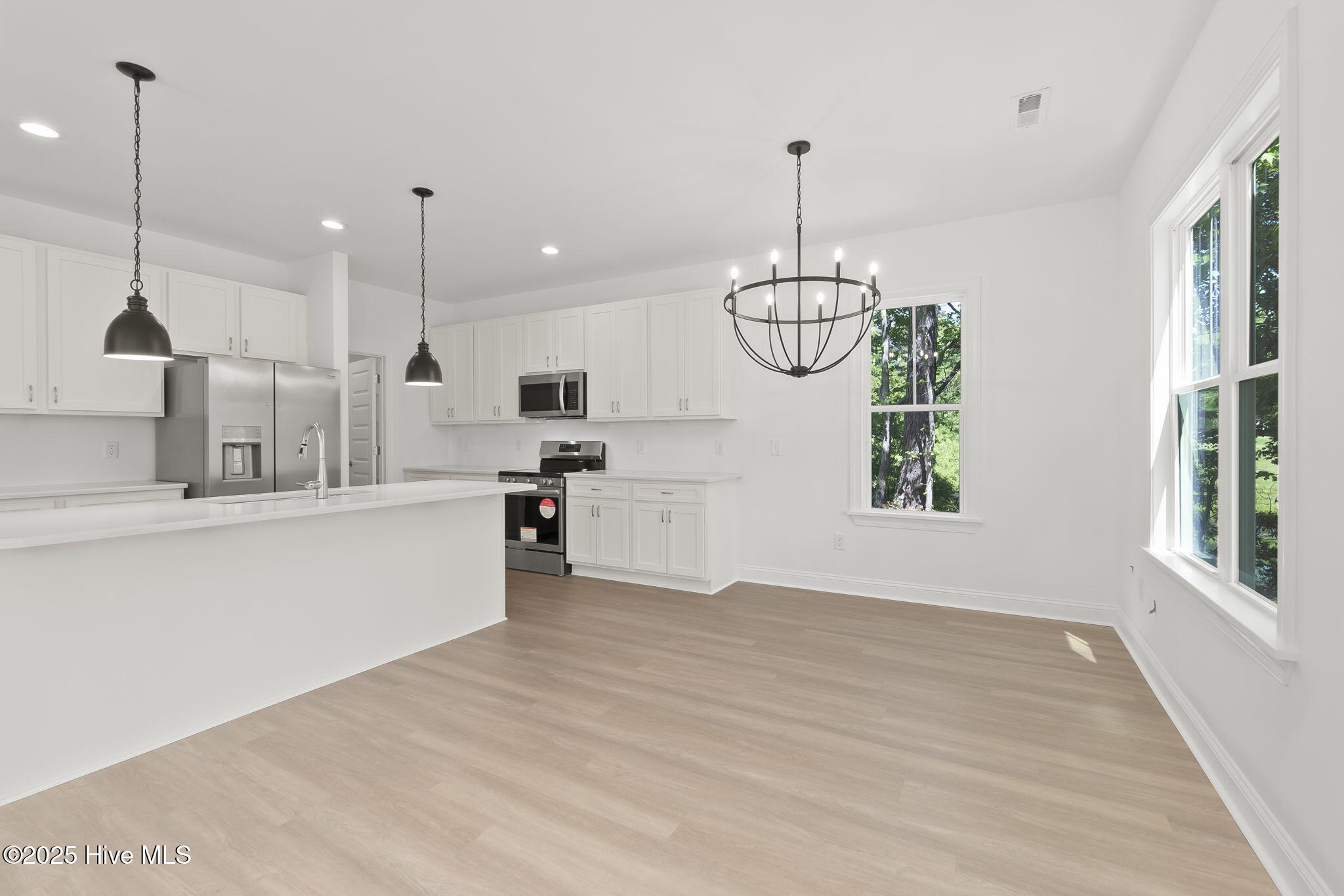 341 McCabe Road Morehead City, NC 28557 - Photo 9 of 38 Open Concept Kitchen/Living/Dining