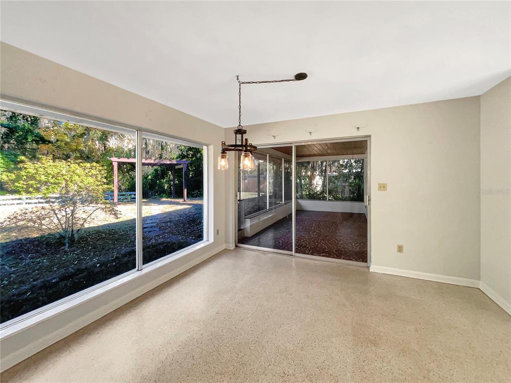 5250 Timberlane Road Lake Wales, FL 33898 - Photo 14 of 23 a view of an empty room with a sliding door