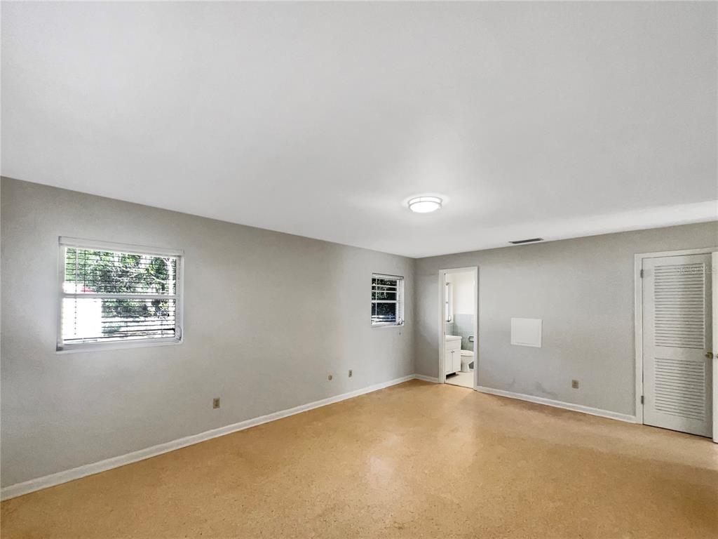 5250 Timberlane Road Lake Wales, FL 33898 - Photo 4 of 23 an empty room with windows and closet