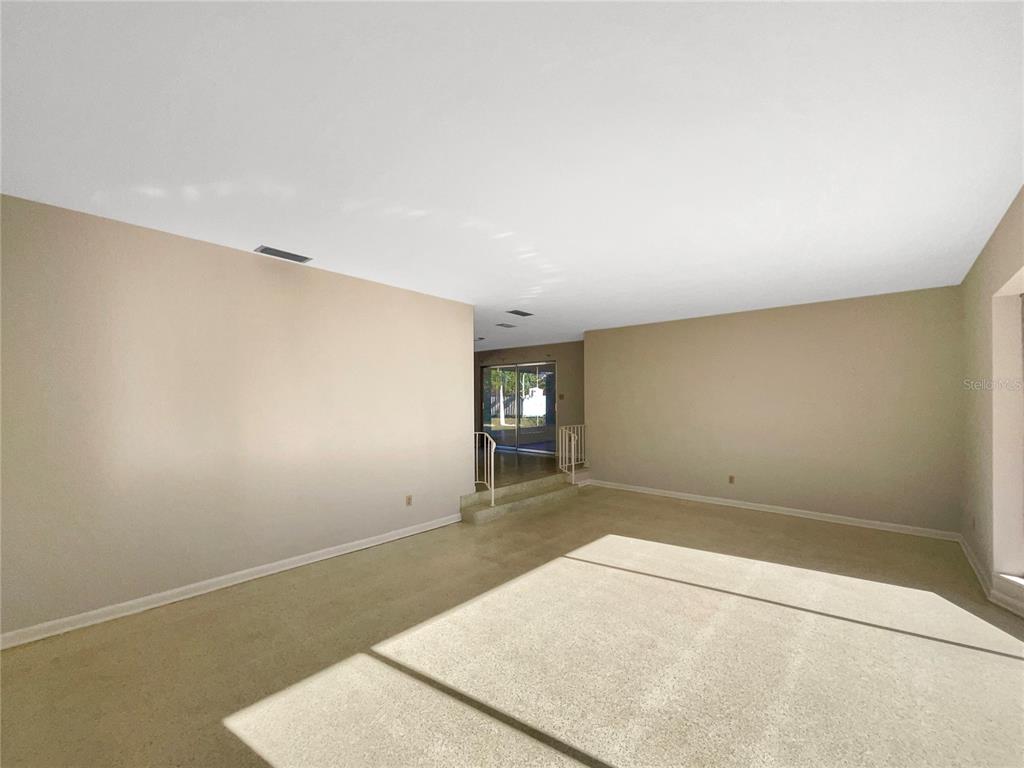 5250 Timberlane Road Lake Wales, FL 33898 - Photo 9 of 23 an empty room with a bench