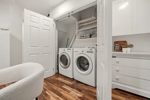 a utility room with dryer and washer