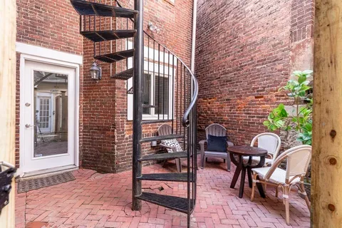 a house view with a garden space