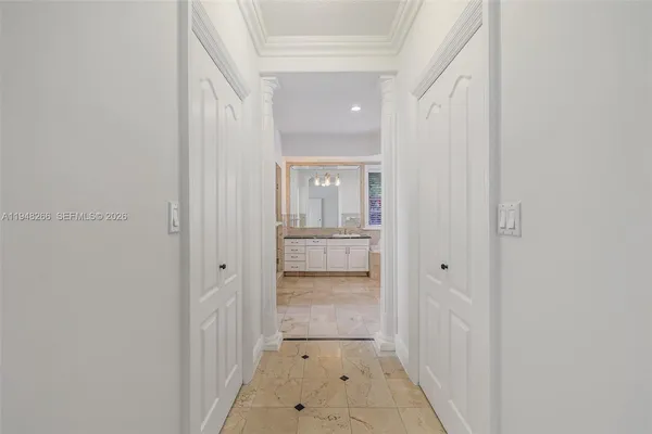a spacious bathroom with a granite countertop sink toilet and shower