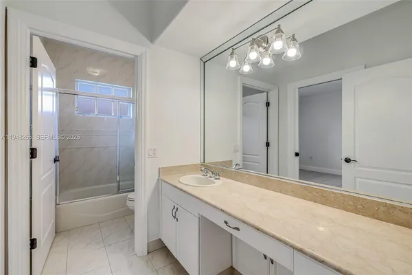 a picture of a room with a cabinet