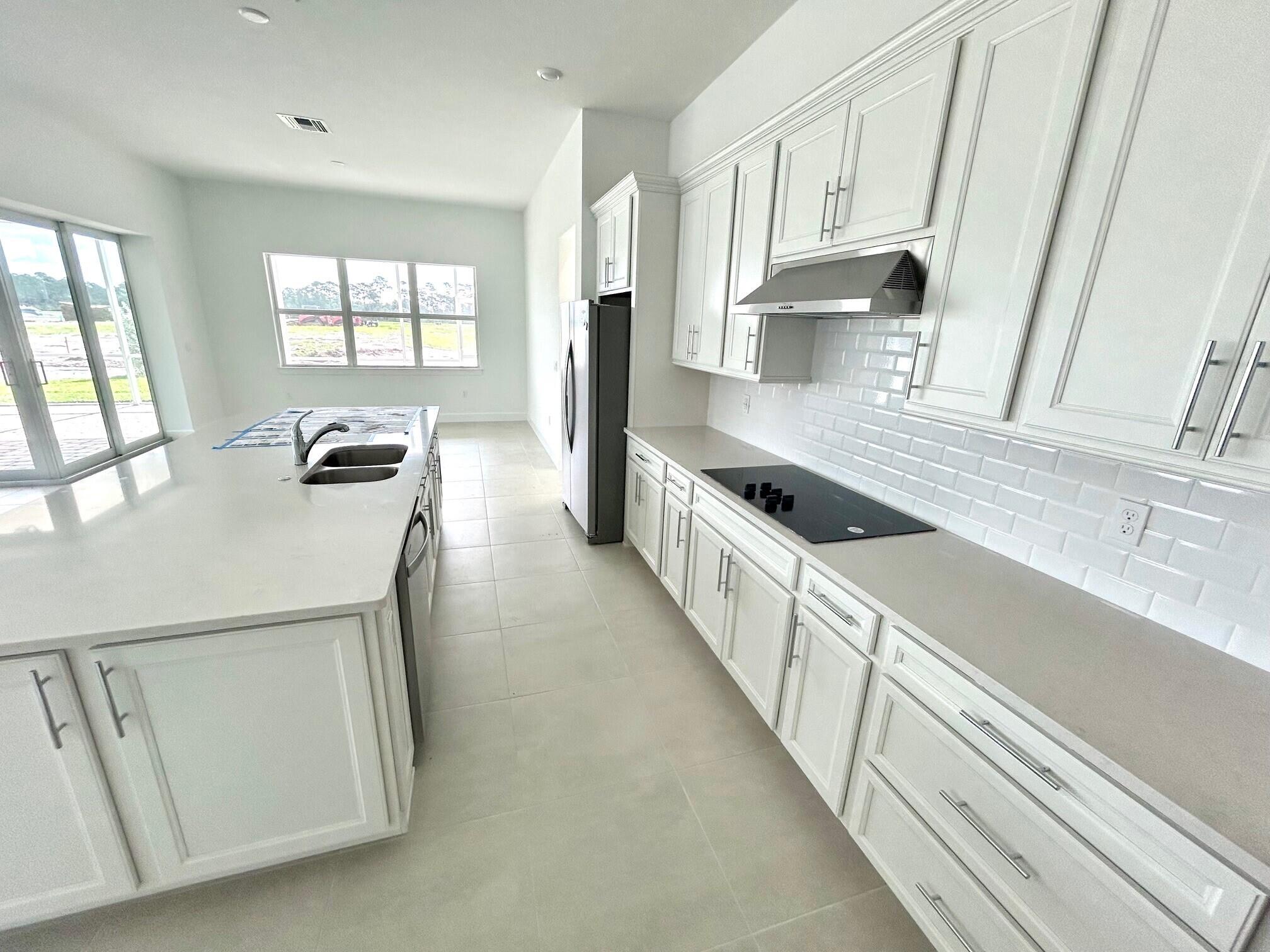 10211 Southwest Highpointe Drive, Unit RENOWN 283 Stuart, FL 34997 - Photo 10 of 34 283 Kitchen Progress