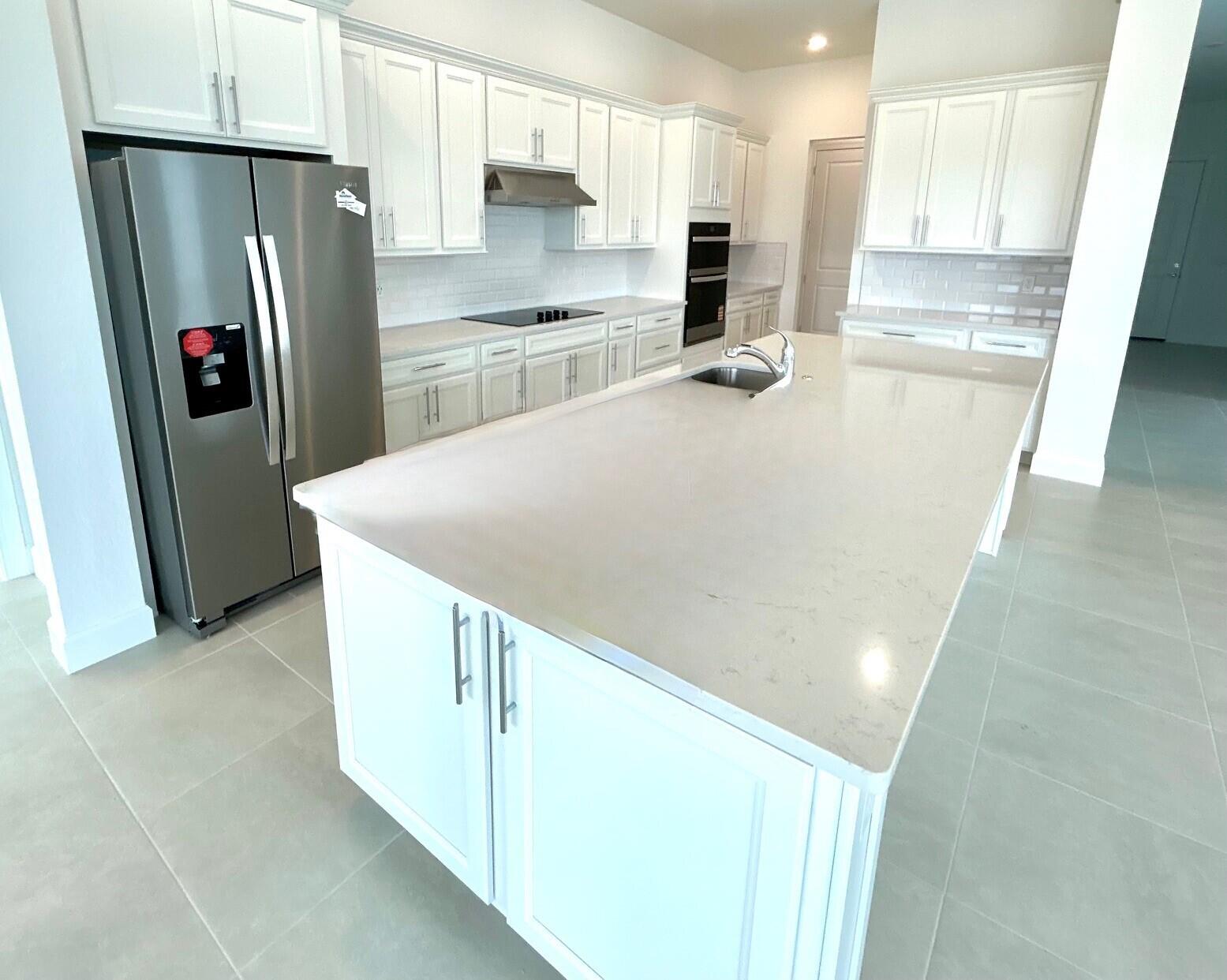 10211 Southwest Highpointe Drive, Unit RENOWN 283 Stuart, FL 34997 - Photo 9 of 34 283 Kitchen