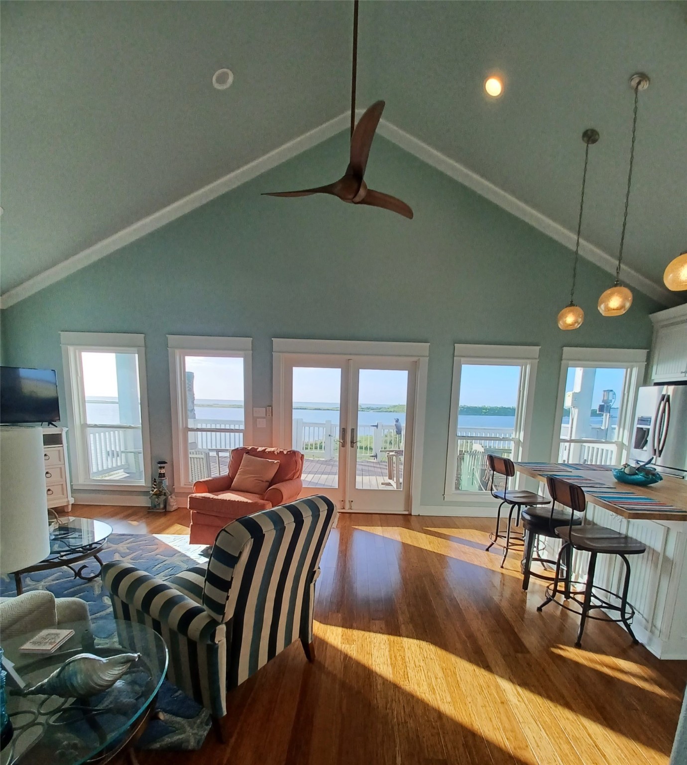 1279 Faggard Road Port Bolivar, TX 77650 - Photo 4 of 14 a living room with furniture dining table and a large window